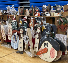 Christmas yard decorations displayed for sale.